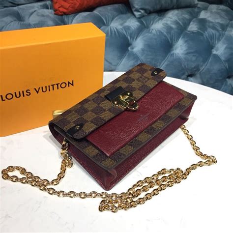 lv vavin chain wallet review